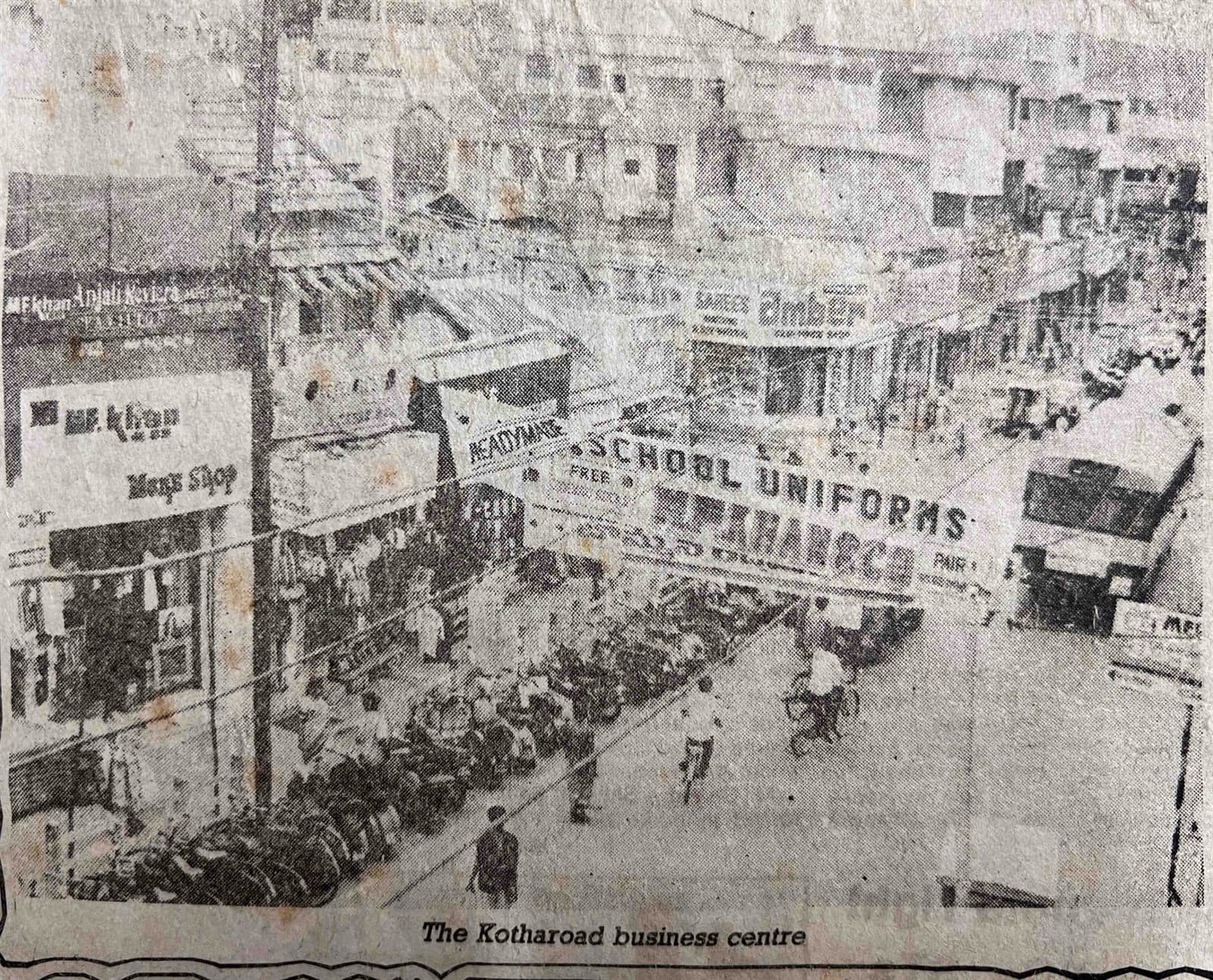The Architectural Heritage of Kotharoad (1970s) - Detailed view of the storefront signage and architecture during the golden tailoring era. | MF.Khan Heritage Archives Visakhapatnam