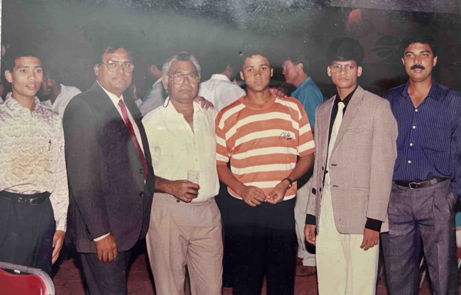 Commemorative Gathering of the House & Associates (1990s) - A commemorative gathering bringing together family members, senior associates, and well-wishers during a festive milestone celebration. | MF.Khan Heritage Archives Visakhapatnam