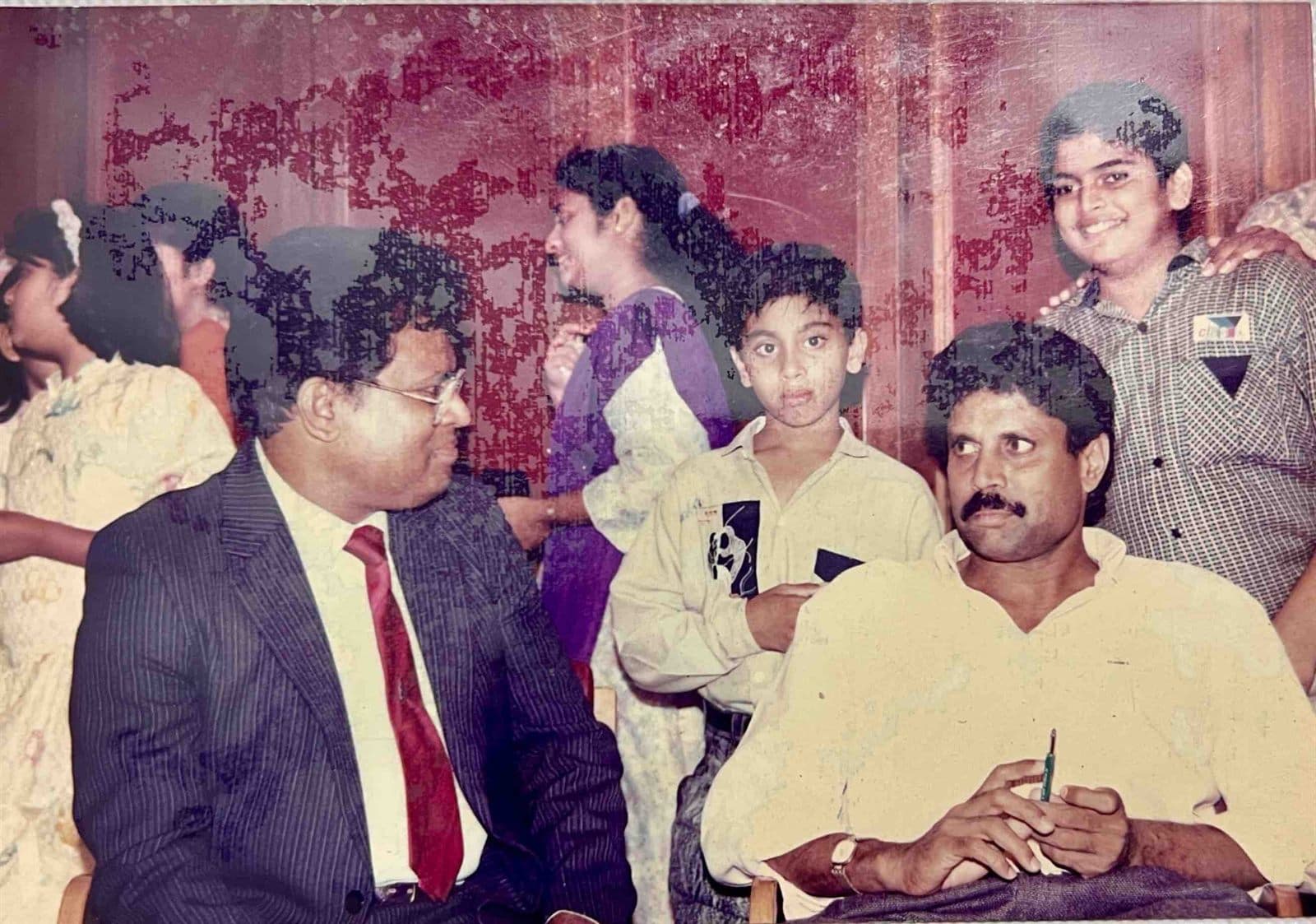 Candid Afternoon with Kapil Dev (1980s - 1990s) - Chairman Mohammed Ahmed Ali Khan in conversation with 1983 World Cup-winning cricket captain Kapil Dev and young admirers during his visit to Visakhapatnam. | MF.Khan Heritage Archives Visakhapatnam